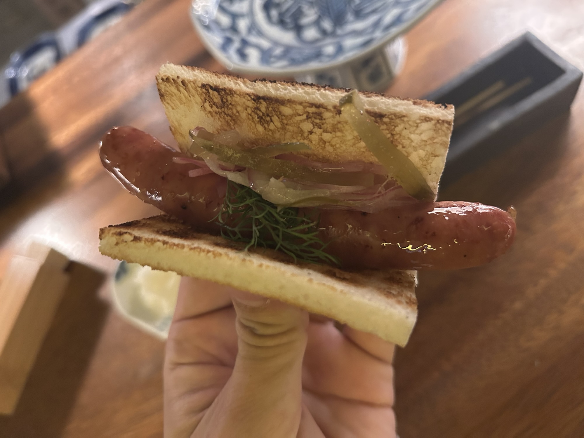 神楽坂 やきとり松明 TAIMATSU 比内地鶏のソーセージホットドッグ